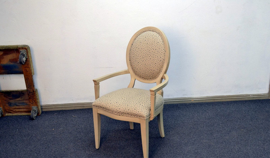 Cream oval-back chairs and settee with an urn-base table, custom built by Sigla Furniture