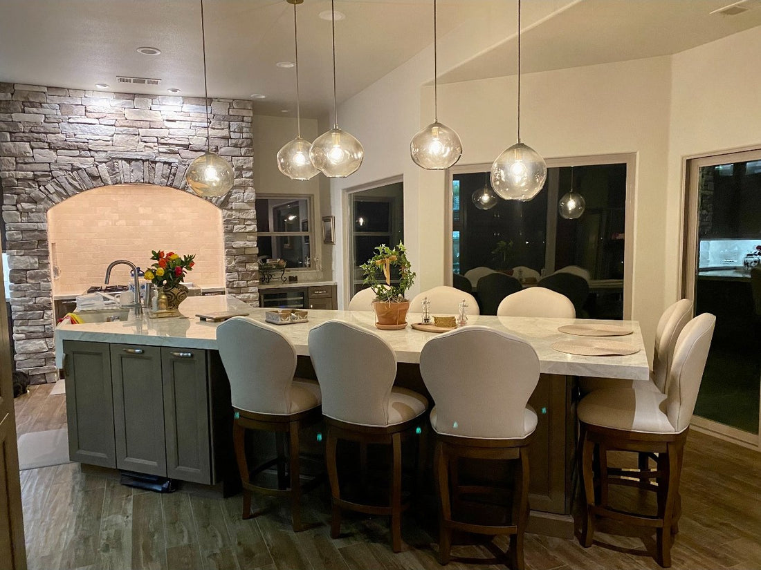 Upholstered barstools at a kitchen island