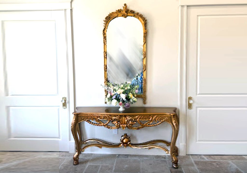 Carved Louis XVI consoles at a wedding venue grand opening