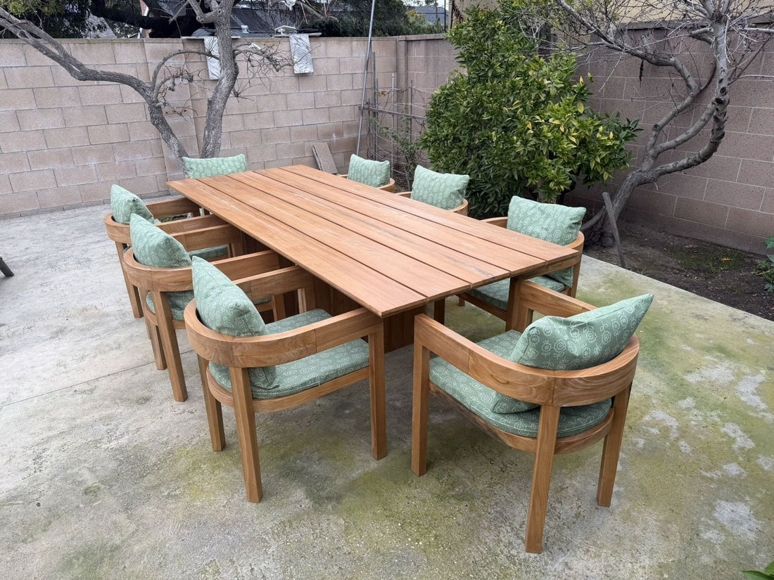 Outdoor plank-top dining table with matching armchairs