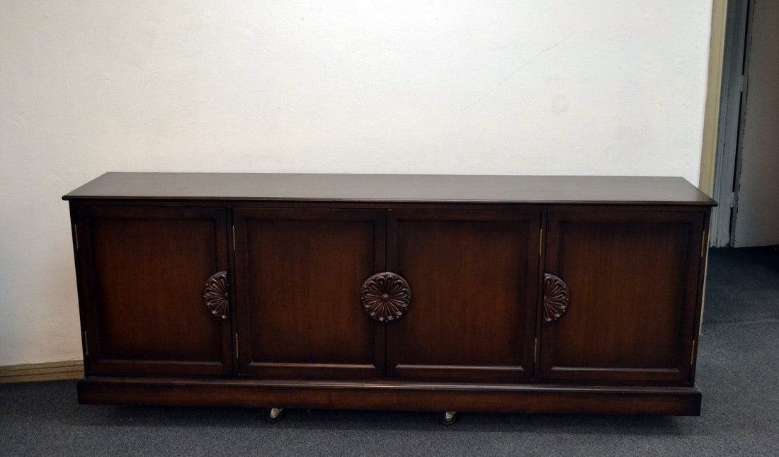 Walnut sideboards with carved medallion door panels