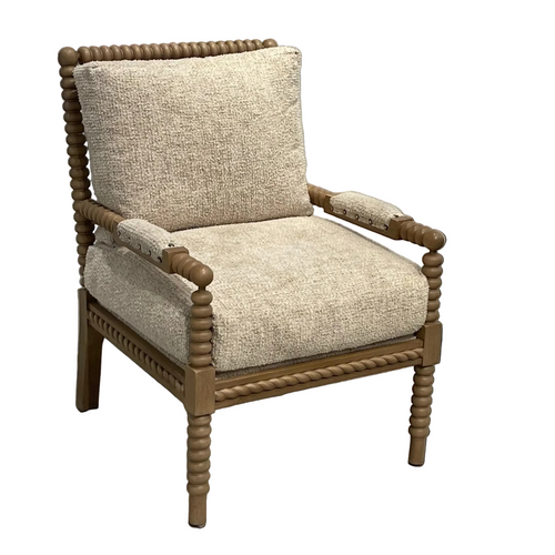 Chair with wooden frame and beige cushion on a plain floor.